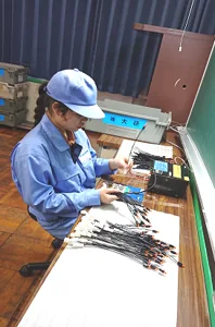 NCI自社工場でのワイヤーハーネス関連作業