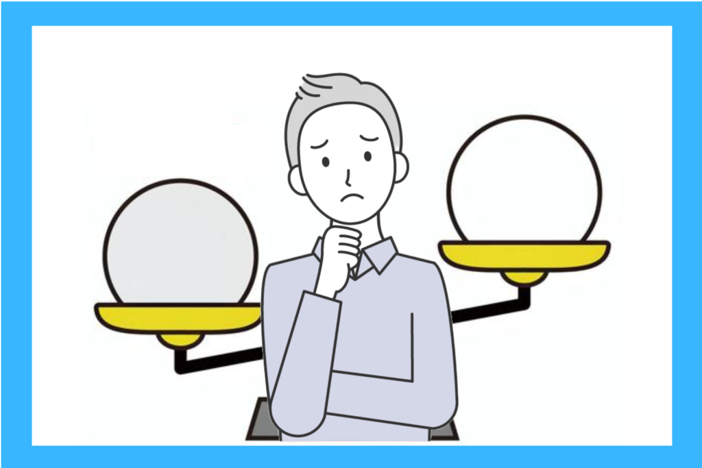 alt="正社員か派遣かで悩む男性”